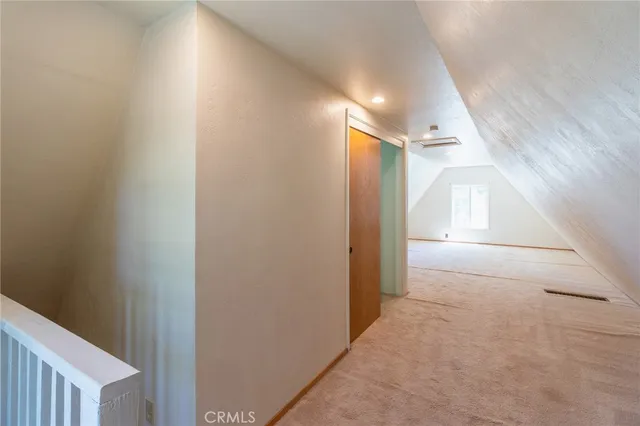 an empty room with a hallway