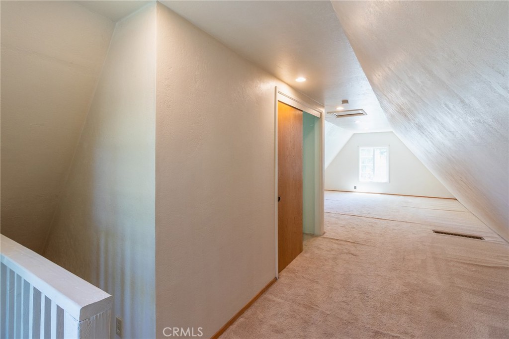 26370 Alpine Lane Twin Peaks, CA 92391 - Photo 15 of 37 a view of hallway with window