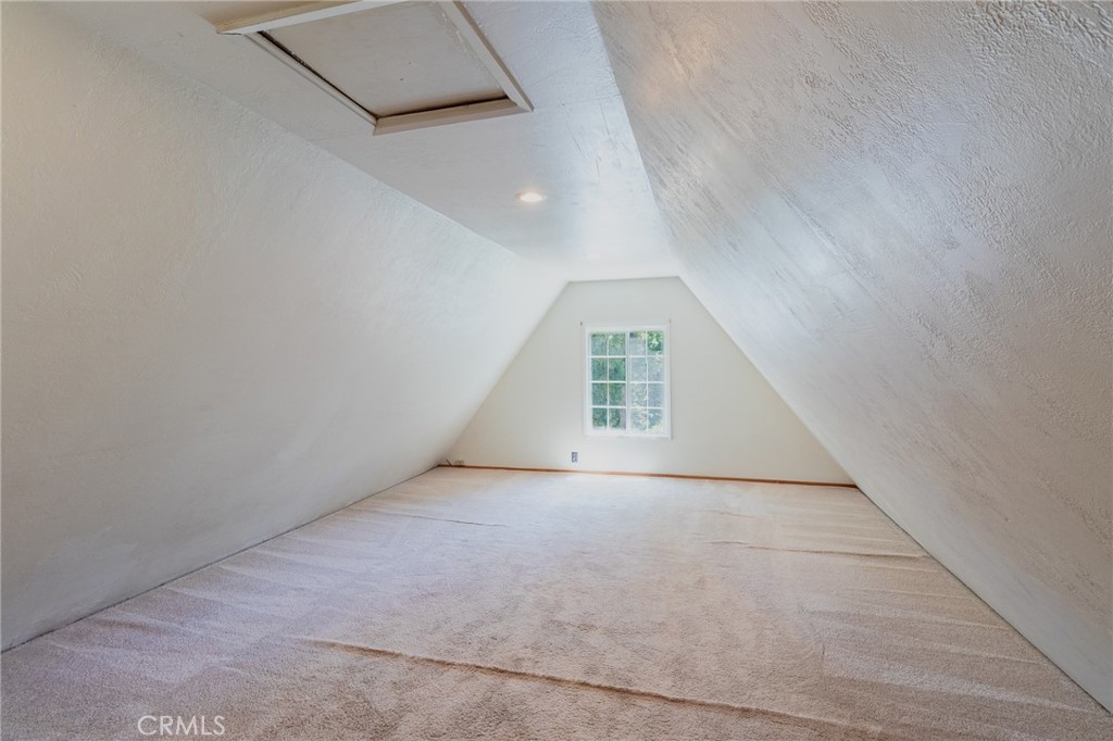 26370 Alpine Lane Twin Peaks, CA 92391 - Photo 19 of 37 an empty room with windows