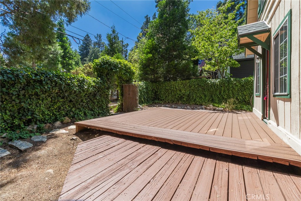 26370 Alpine Lane Twin Peaks, CA 92391 - Photo 8 of 37 a view of deck with patio