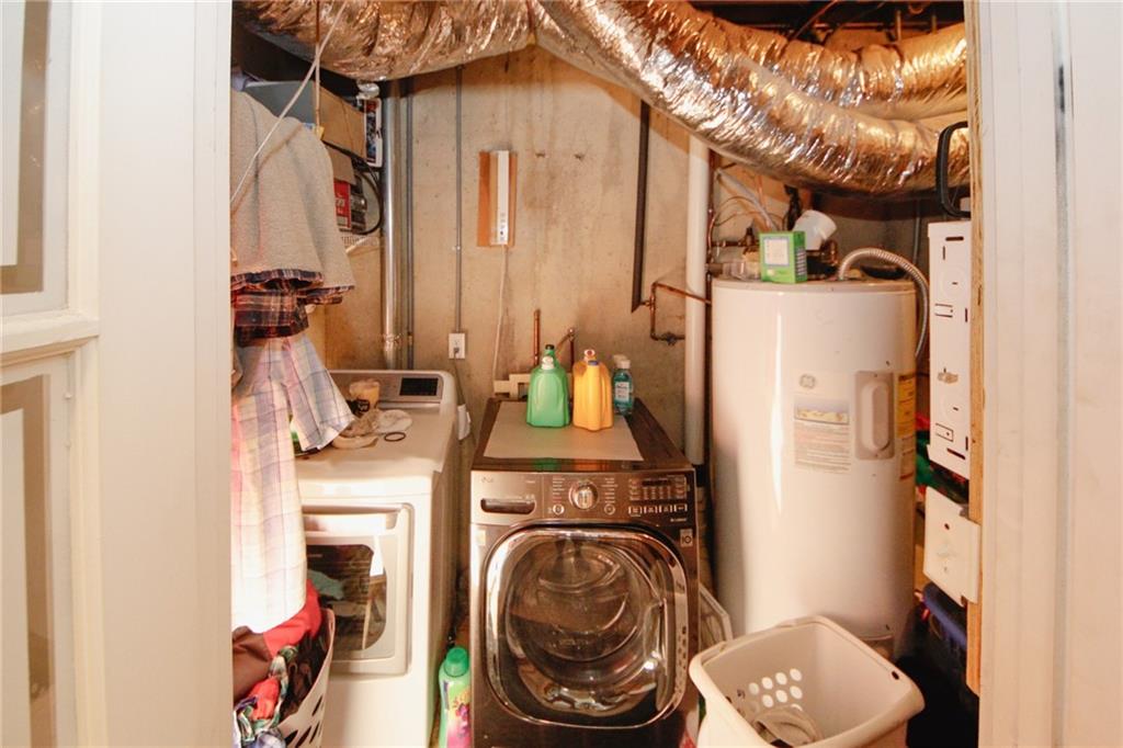 1120 Carl-Bethlehem Road Winder, GA 30680 - Photo 23 of 57 a utility room with dryer and washer