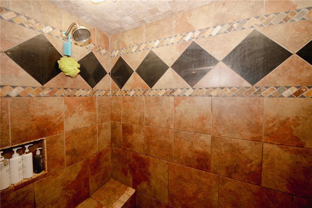 1120 Carl-Bethlehem Road Winder, GA 30680 - Photo 35 of 57 a bathroom with a shower