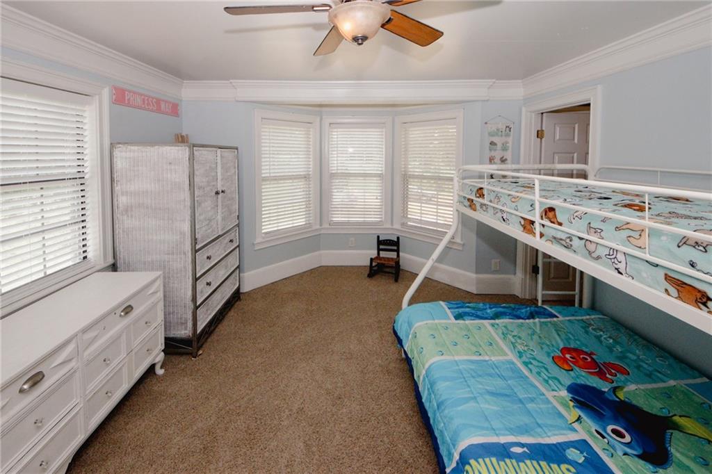 1120 Carl-Bethlehem Road Winder, GA 30680 - Photo 36 of 57 a bed room with furniture and a window