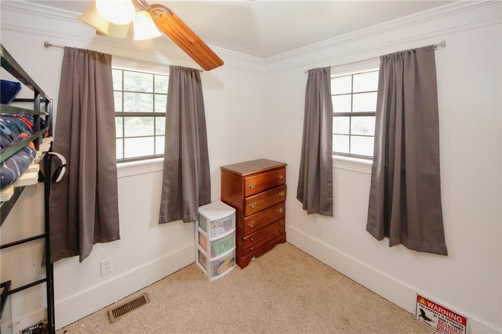 1120 Carl-Bethlehem Road Winder, GA 30680 - Photo 37 of 57 a room with window and furniture