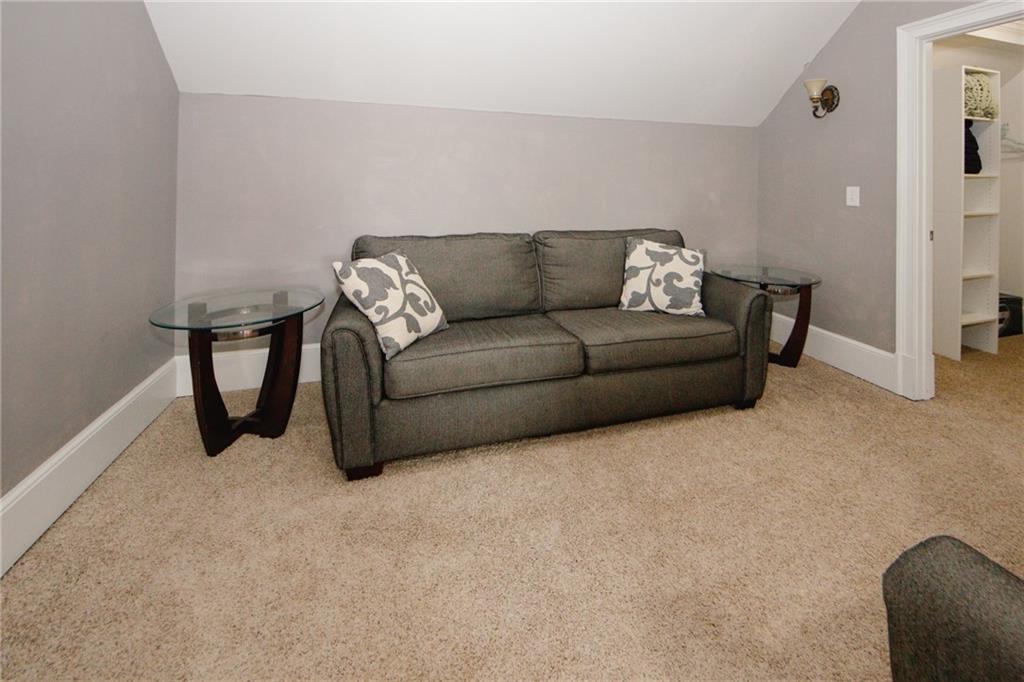 1120 Carl-Bethlehem Road Winder, GA 30680 - Photo 46 of 57 a living room with furniture and a couch