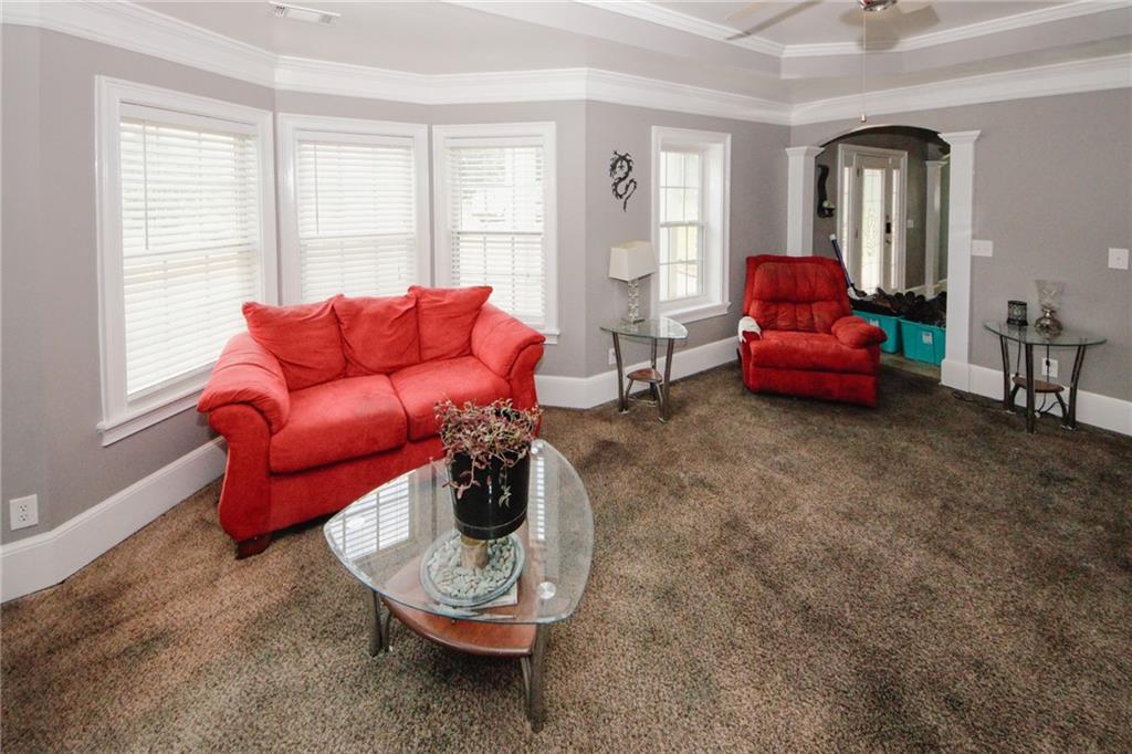 1120 Carl-Bethlehem Road Winder, GA 30680 - Photo 7 of 57 a living room with furniture and wooden floor