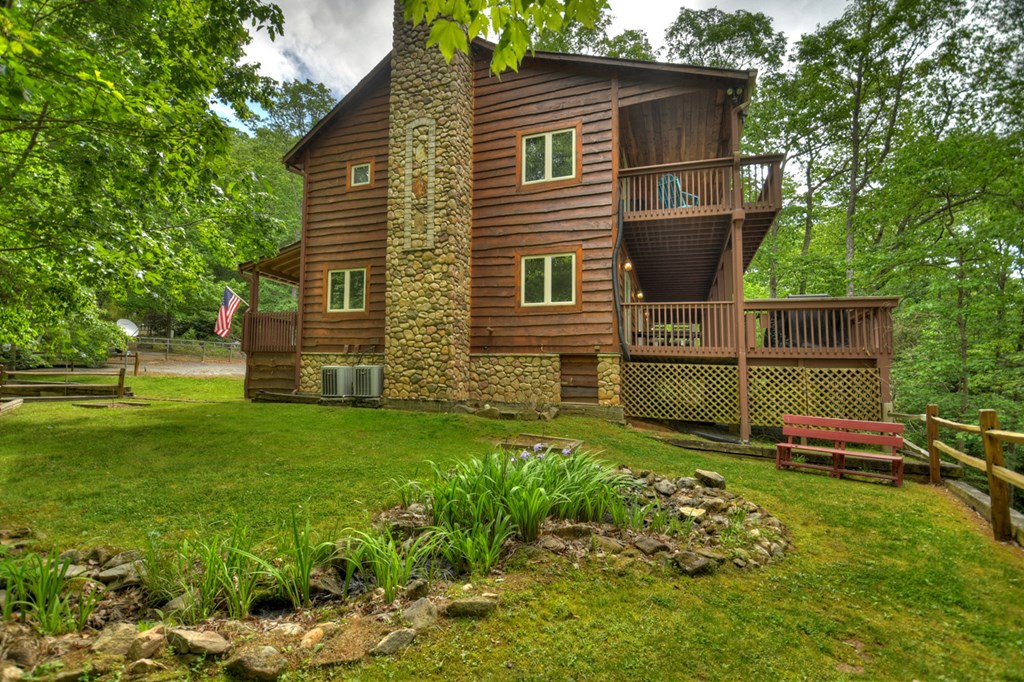 300 Forest Drive Morganton, GA 30560 - Photo 4 of 73 Side Elevation w/Koi Pond & Custom Rock Chimney