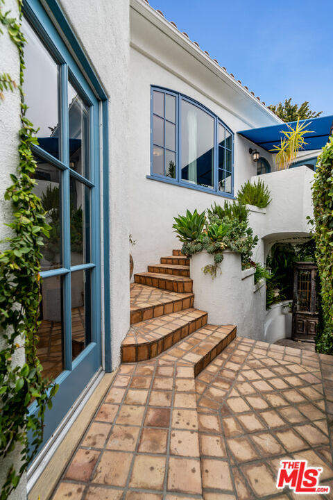 2125 Rockledge Road Los Angeles, CA 90068 - Photo 14 of 21 a front view of a house with a yard