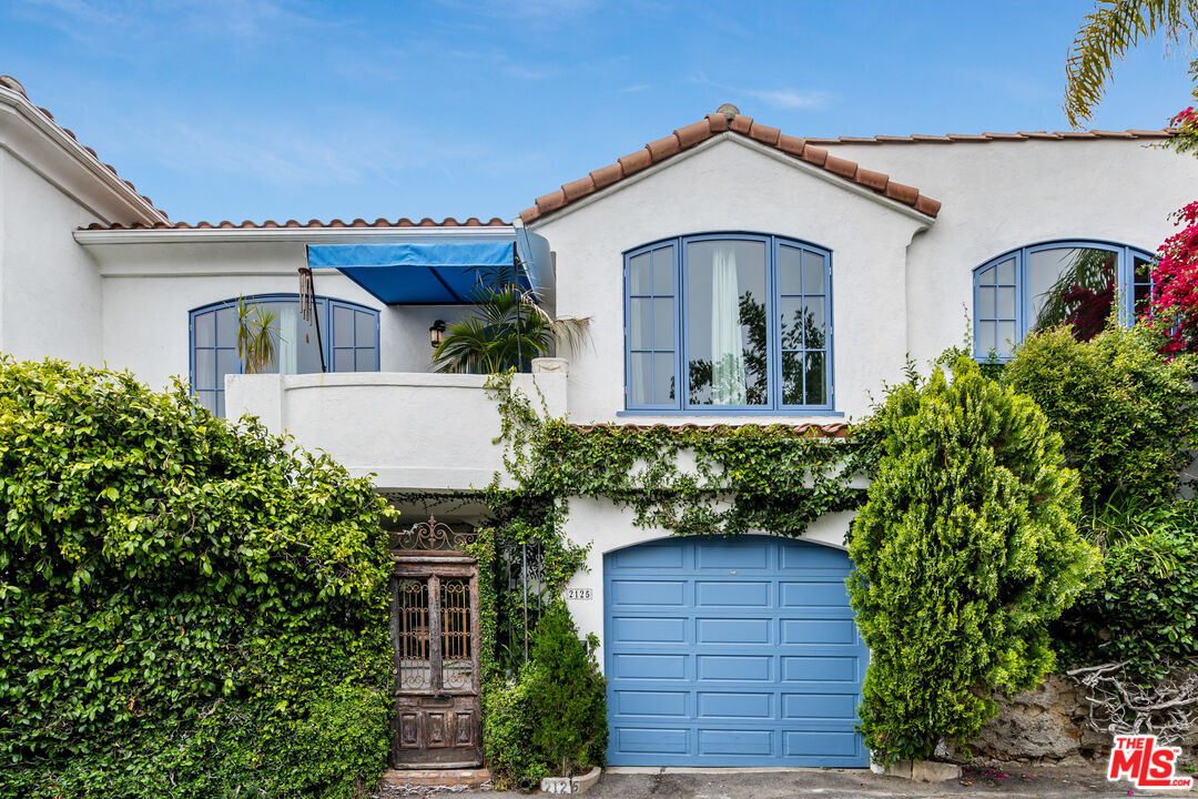 2125 Rockledge Road Los Angeles, CA 90068 - Photo 17 of 21 front view of a house with a yard