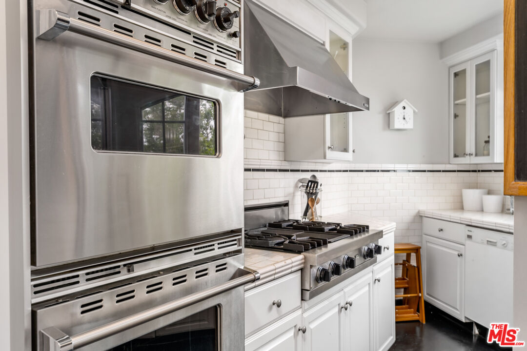 2125 Rockledge Road Los Angeles, CA 90068 - Photo 6 of 21 a kitchen with a stove and a microwave