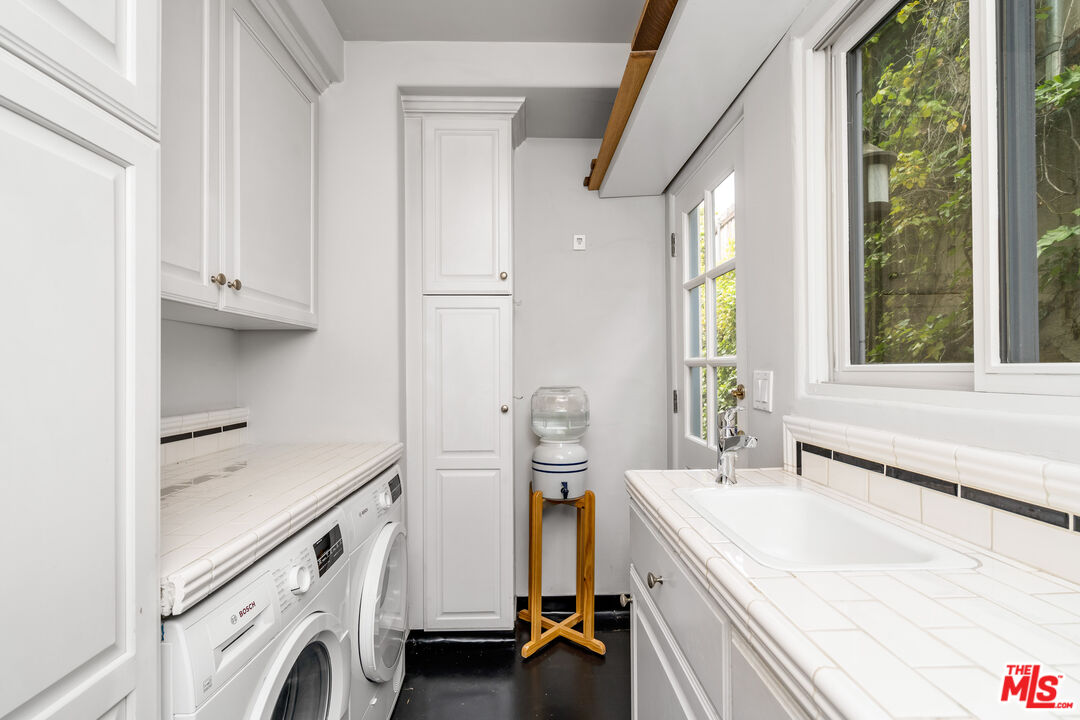 2125 Rockledge Road Los Angeles, CA 90068 - Photo 7 of 21 a view of a kitchen with utility and sink