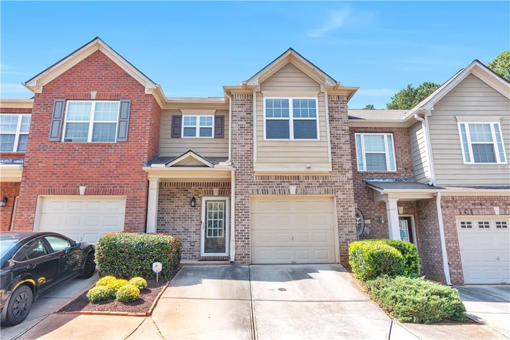 4094 Dahlgreen Way Decatur, GA 30032 - Photo 1 of 1 a front view of a house with garden
