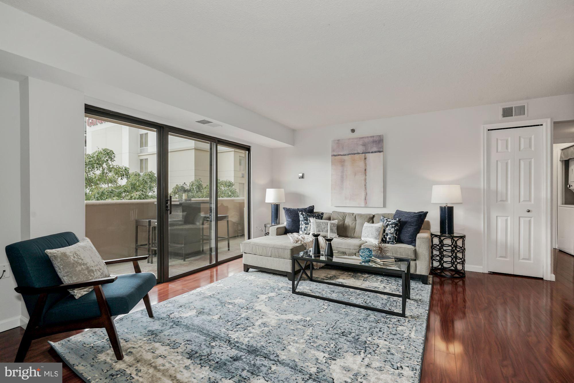 1301 North Courthouse Road, Unit 801 Arlington, VA 22201 - Photo 8 of 31 Bright living w/floor-to-ceiling sliding glass