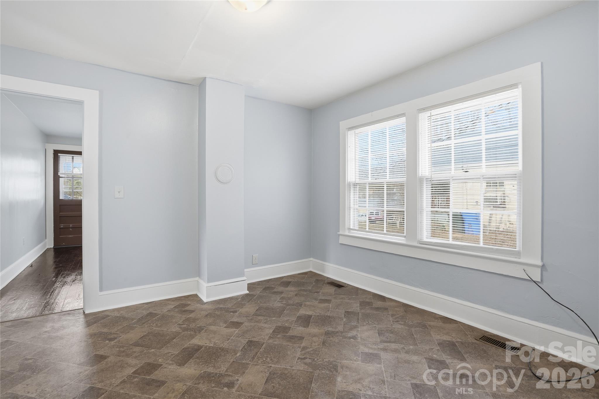 358 North Cleghorn Street Rutherfordton, NC 28139 - Photo 14 of 21 an empty room with a window