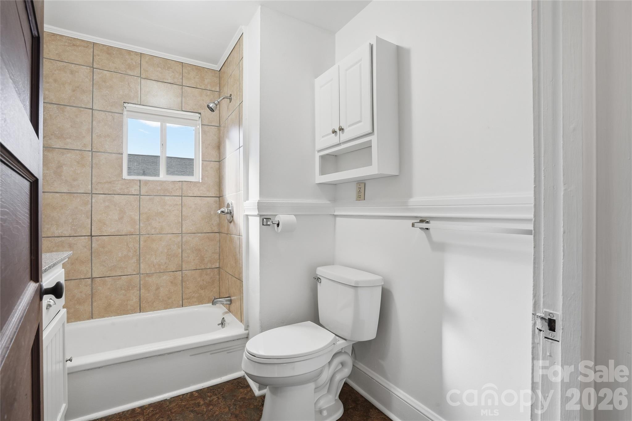 358 North Cleghorn Street Rutherfordton, NC 28139 - Photo 18 of 21 a bathroom with a toilet and a bathtub