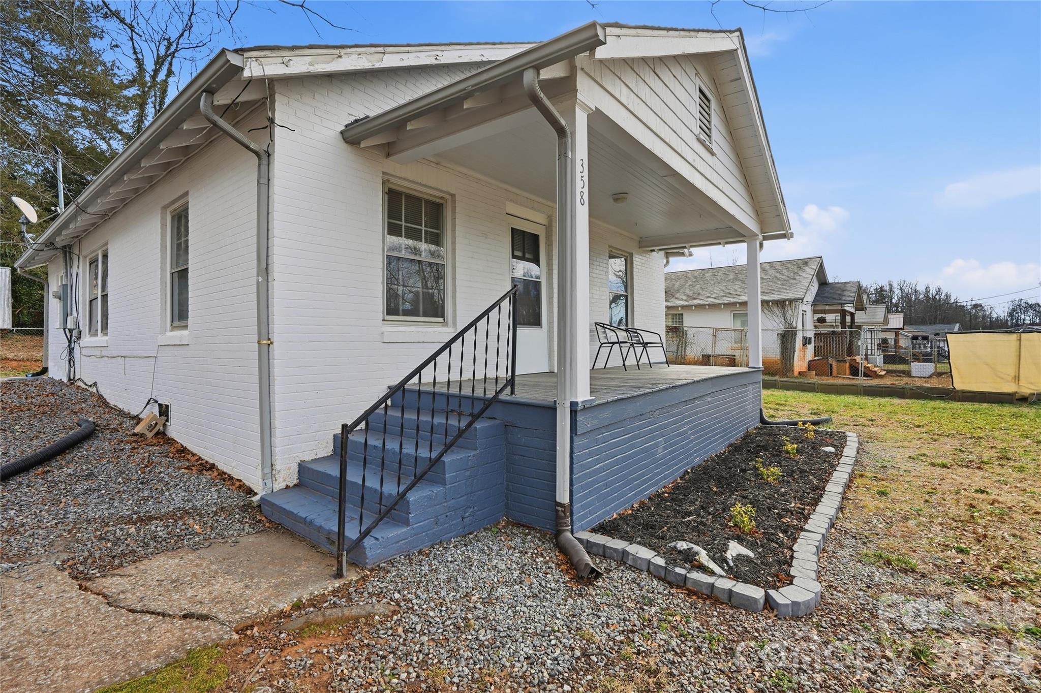 358 North Cleghorn Street Rutherfordton, NC 28139 - Photo 21 of 21 a view of a house with wooden floor and a roof