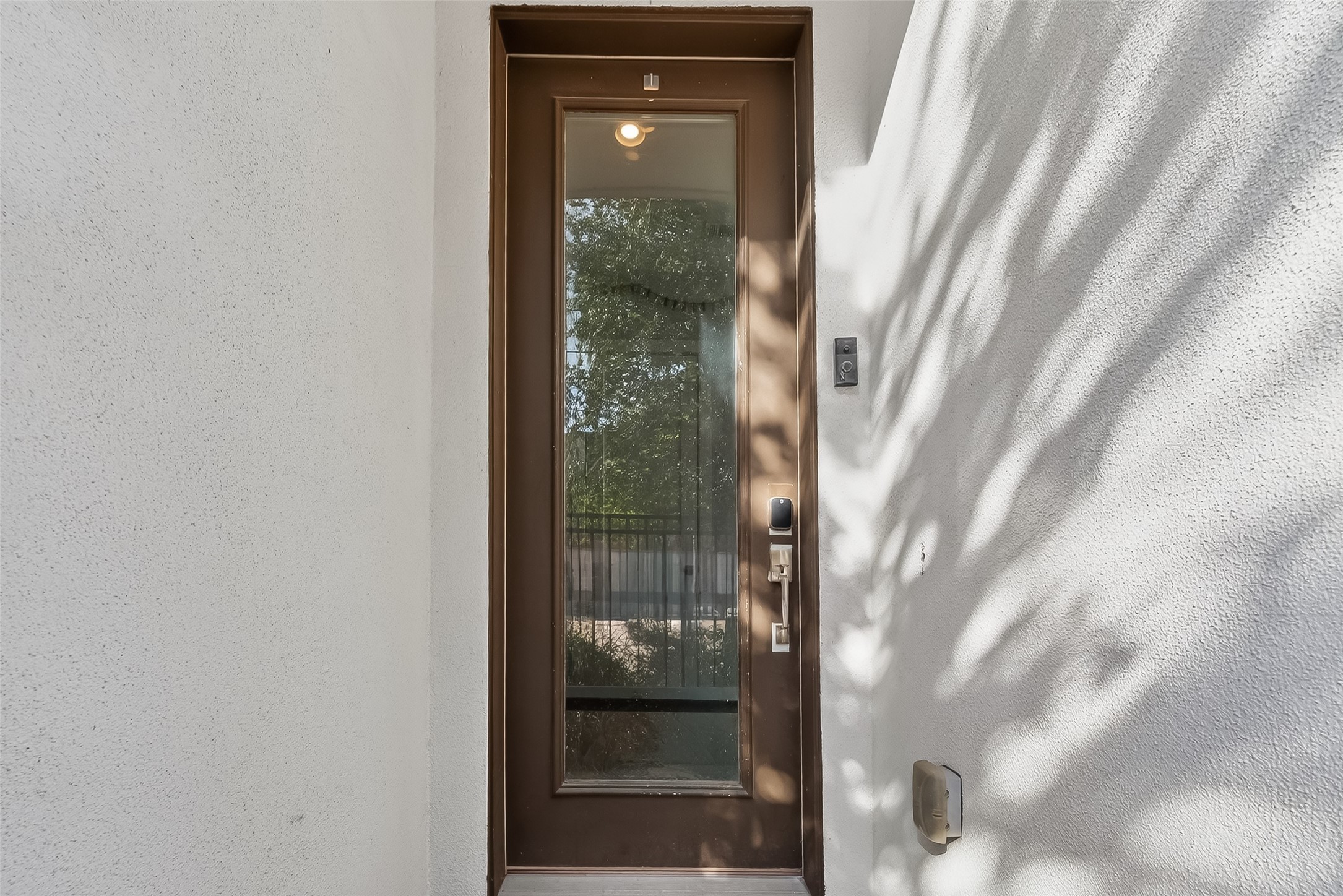 606 Pacific Street Houston, TX 77006 - Photo 7 of 41 a view of a glass door of a house