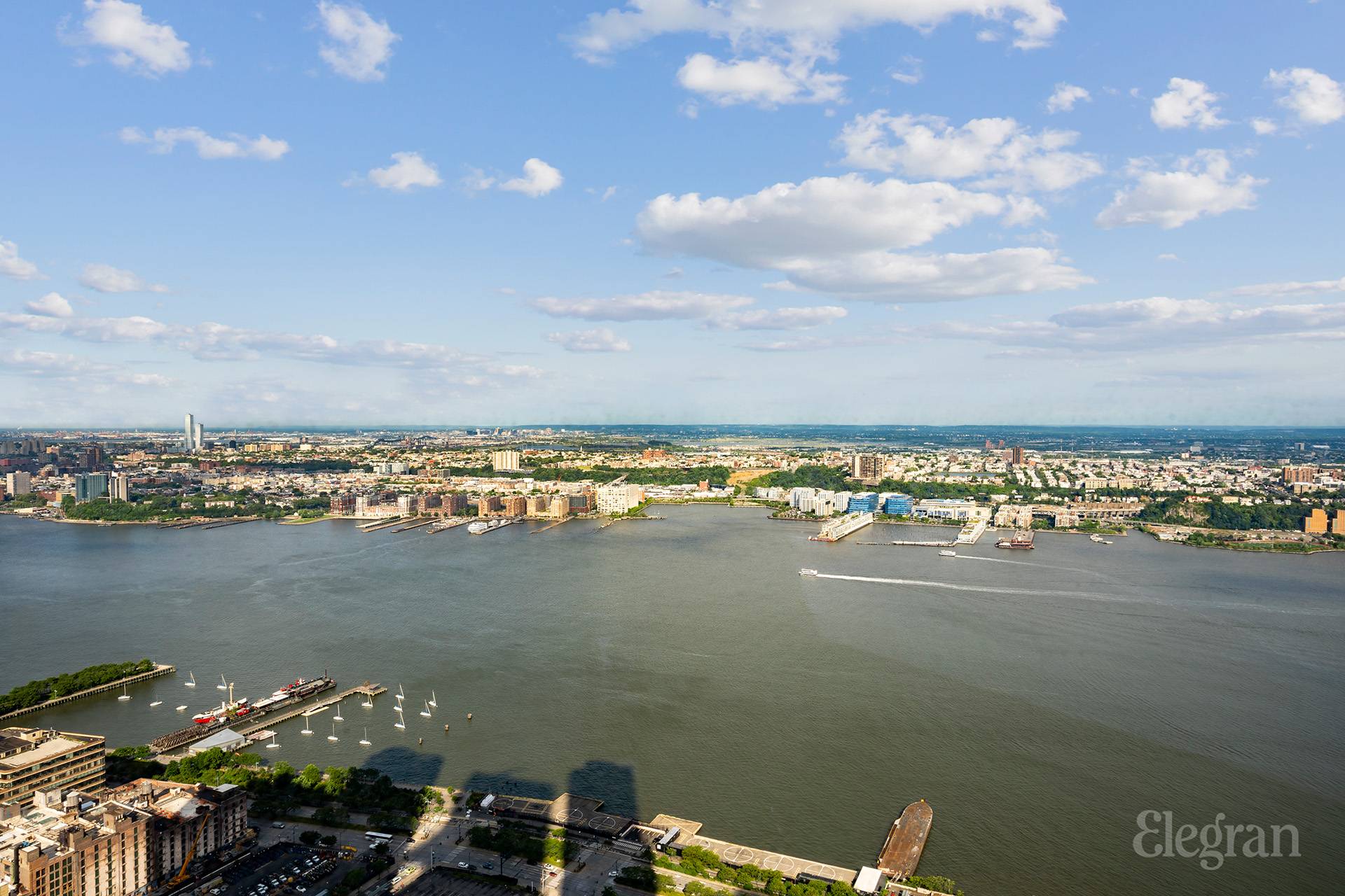35 Hudson Yards, Unit 6901 Manhattan, NY 10001 - Photo 3 of 24 a view of a lake with a city view