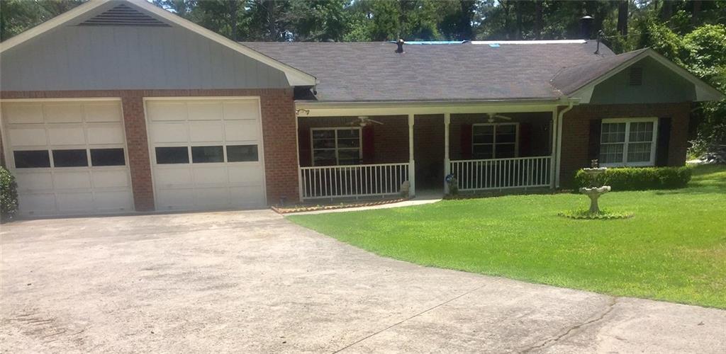 2910 Union Church Road Stockbridge, GA 30281 - Photo 1 of 1 a house view with a garden space