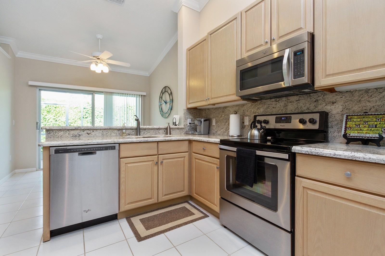 17245 Boca Club Boulevard, Unit 2 Boca Raton, FL 33487 - Photo 7 of 19 06_17245BocaClubBlvd2_177_Kitchen_Custom