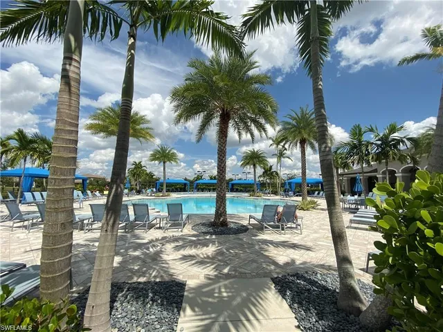 a view of outdoor space with palm trees