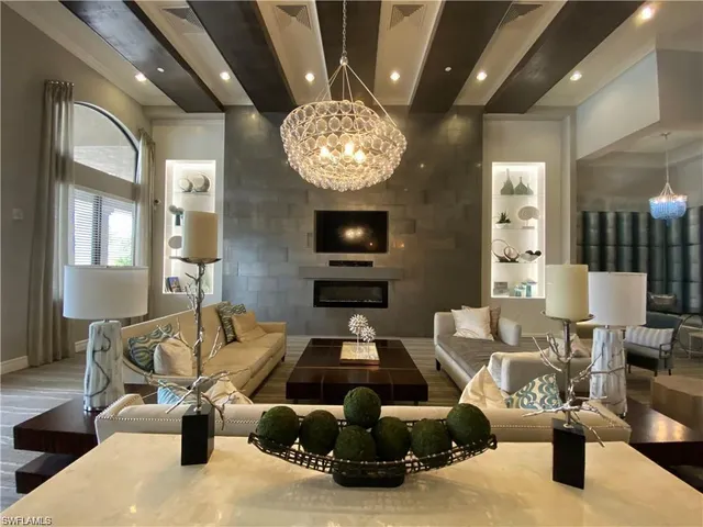 a view of a hallway with seating space