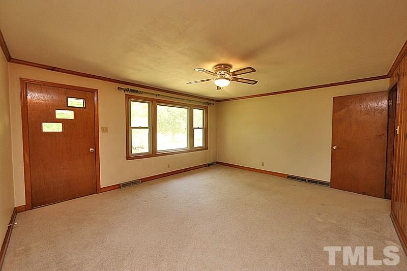 1707 Mason Road Durham, NC 27712 - Photo 2 of 17 a view of an empty room with a window