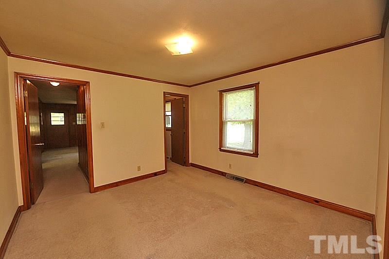 1707 Mason Road Durham, NC 27712 - Photo 5 of 17 an empty room with windows