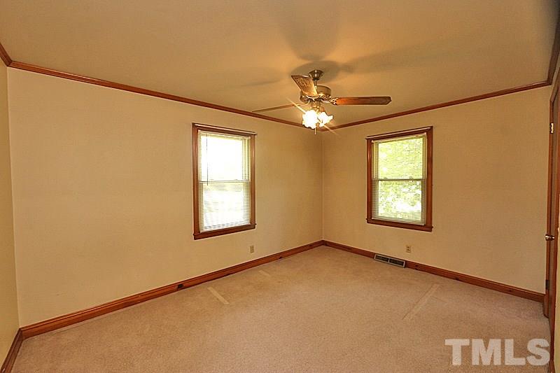 1707 Mason Road Durham, NC 27712 - Photo 7 of 17 a view of an empty room with a window