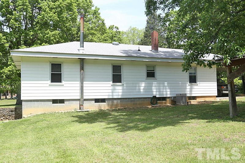 1707 Mason Road Durham, NC 27712 - Photo 10 of 17 a front view of a house with a yard