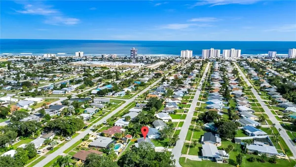 a view of a city with an ocean