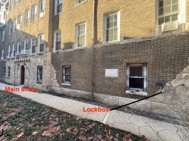 a front view of a building with an empty space