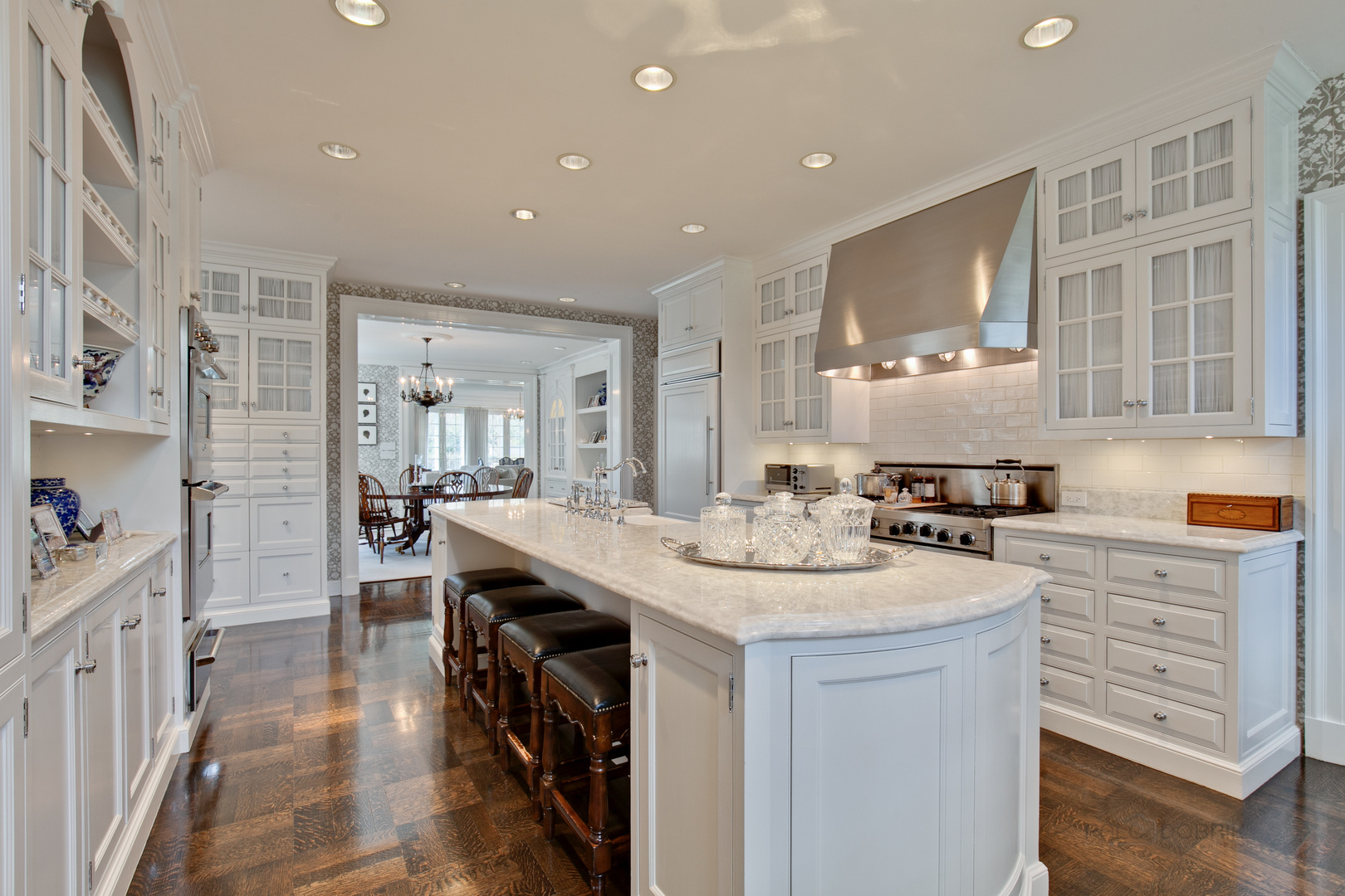 700 South Ridge Road Lake Forest, IL 60045 - Photo 11 of 47 a kitchen with stainless steel appliances granite countertop a sink and dishwasher stove with wooden floor