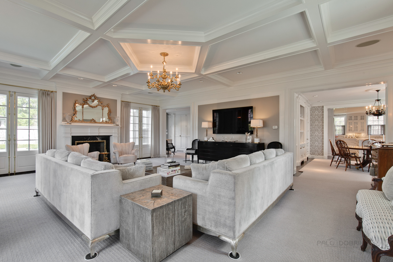 700 South Ridge Road Lake Forest, IL 60045 - Photo 15 of 47 a living room with furniture a fireplace and a chandelier