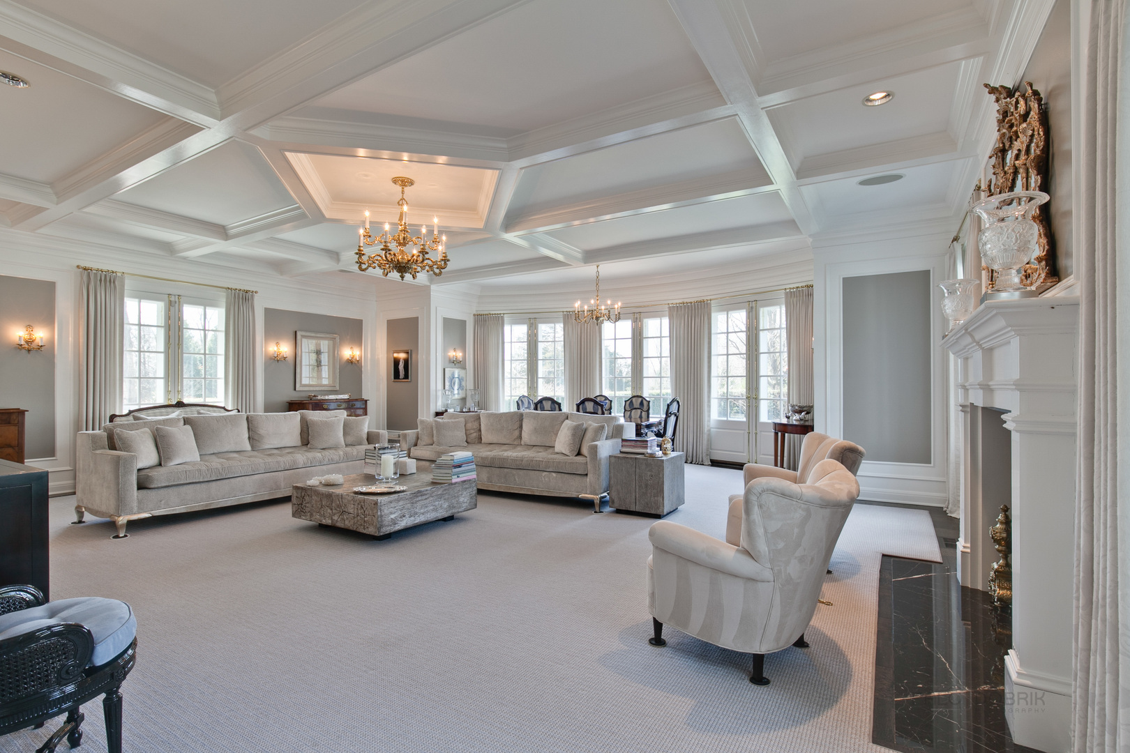 700 South Ridge Road Lake Forest, IL 60045 - Photo 16 of 47 a living room with furniture and a chandelier