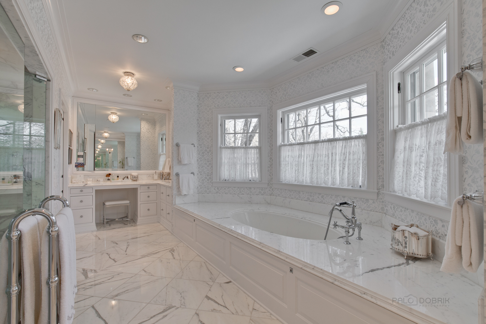 700 South Ridge Road Lake Forest, IL 60045 - Photo 20 of 47 a bathroom with a sink double vanity granite tub shower and a mirror