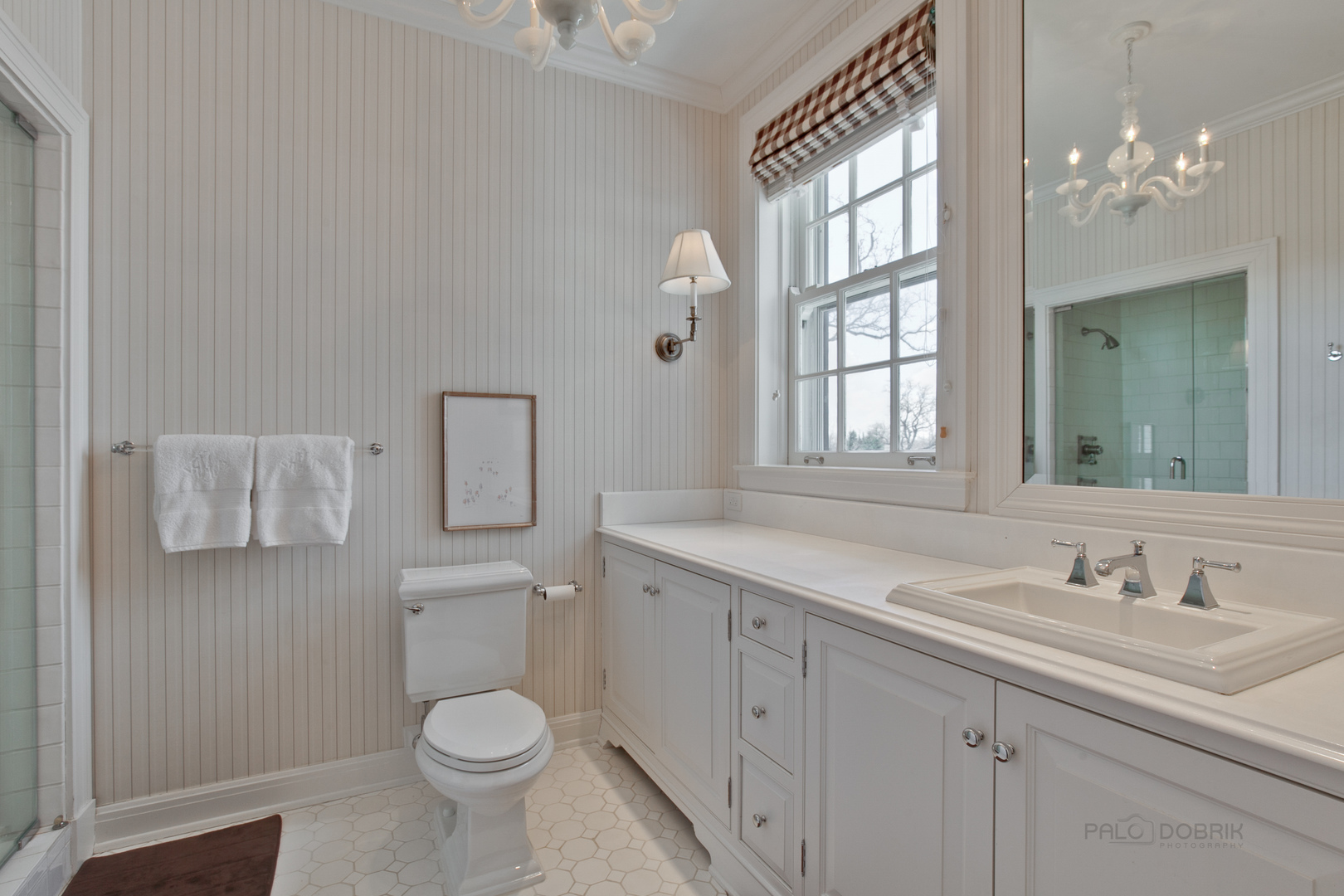 700 South Ridge Road Lake Forest, IL 60045 - Photo 28 of 47 a bathroom with a granite countertop toilet sink and mirror