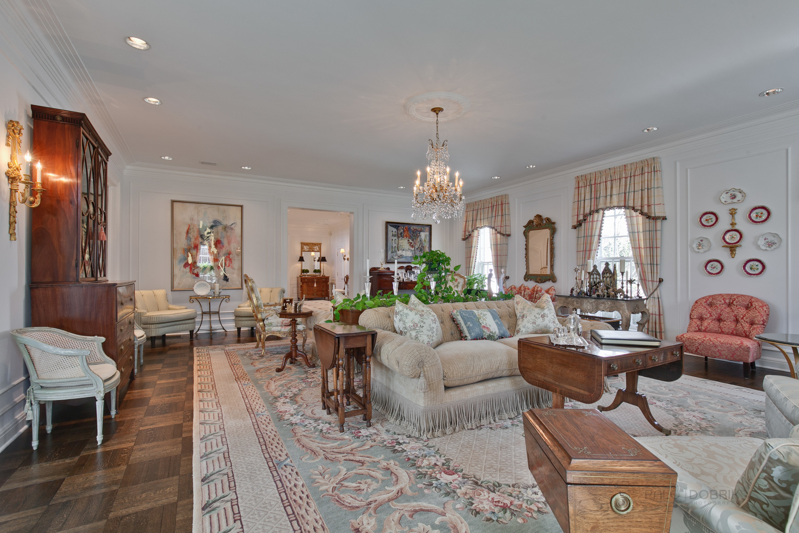 700 South Ridge Road Lake Forest, IL 60045 - Photo 4 of 47 a living room with lots of furniture and chandelier