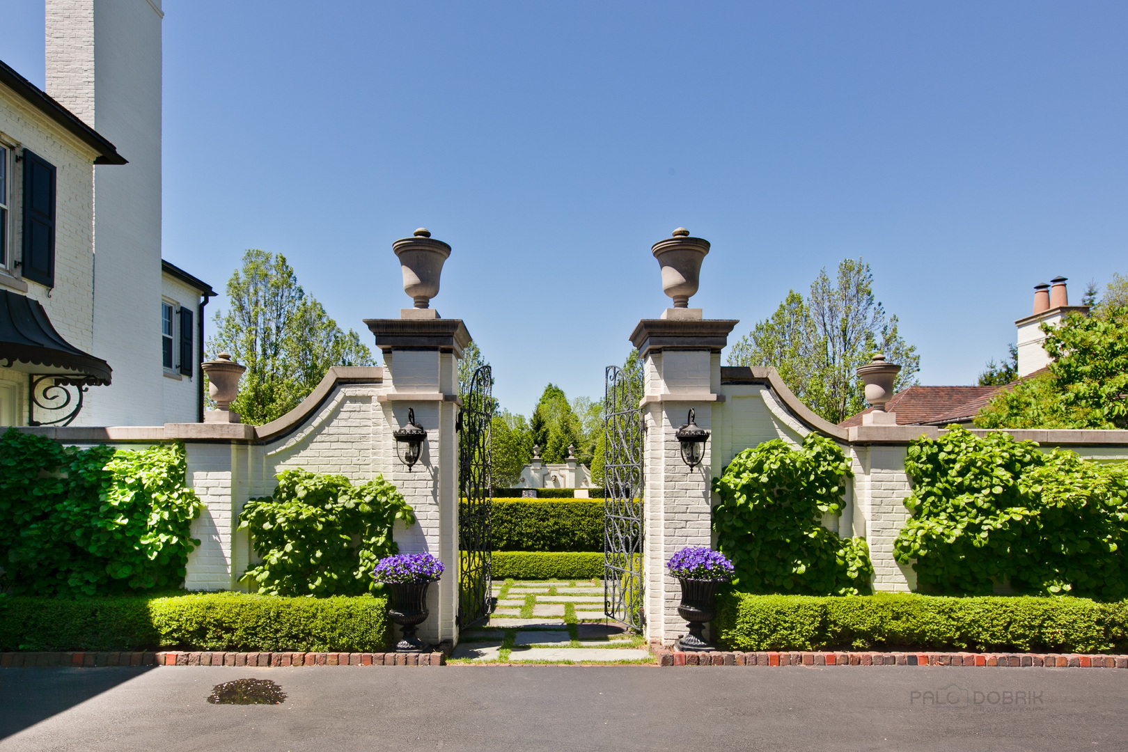 700 South Ridge Road Lake Forest, IL 60045 - Photo 31 of 47 front view of house with potted plants in front of it