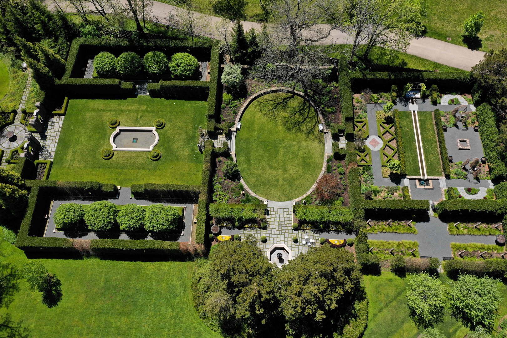 700 South Ridge Road Lake Forest, IL 60045 - Photo 39 of 47 an aerial view of a house with a garden and trees