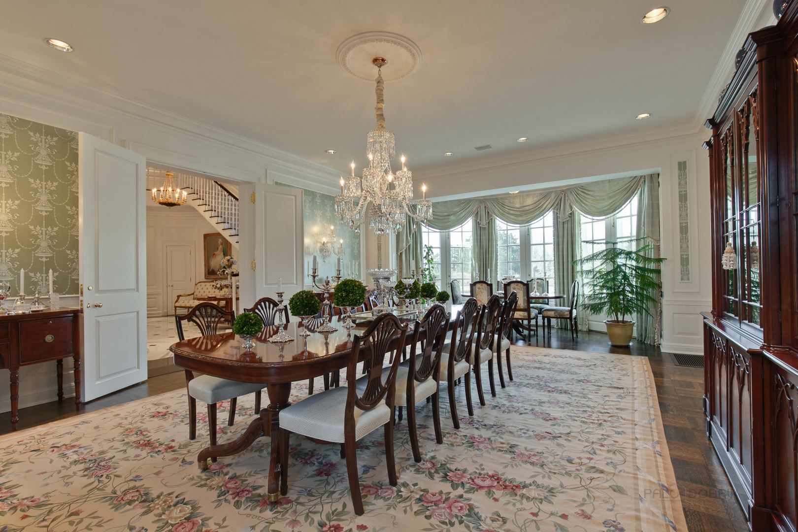 700 South Ridge Road Lake Forest, IL 60045 - Photo 9 of 47 a view of a dining room with furniture and chandelier