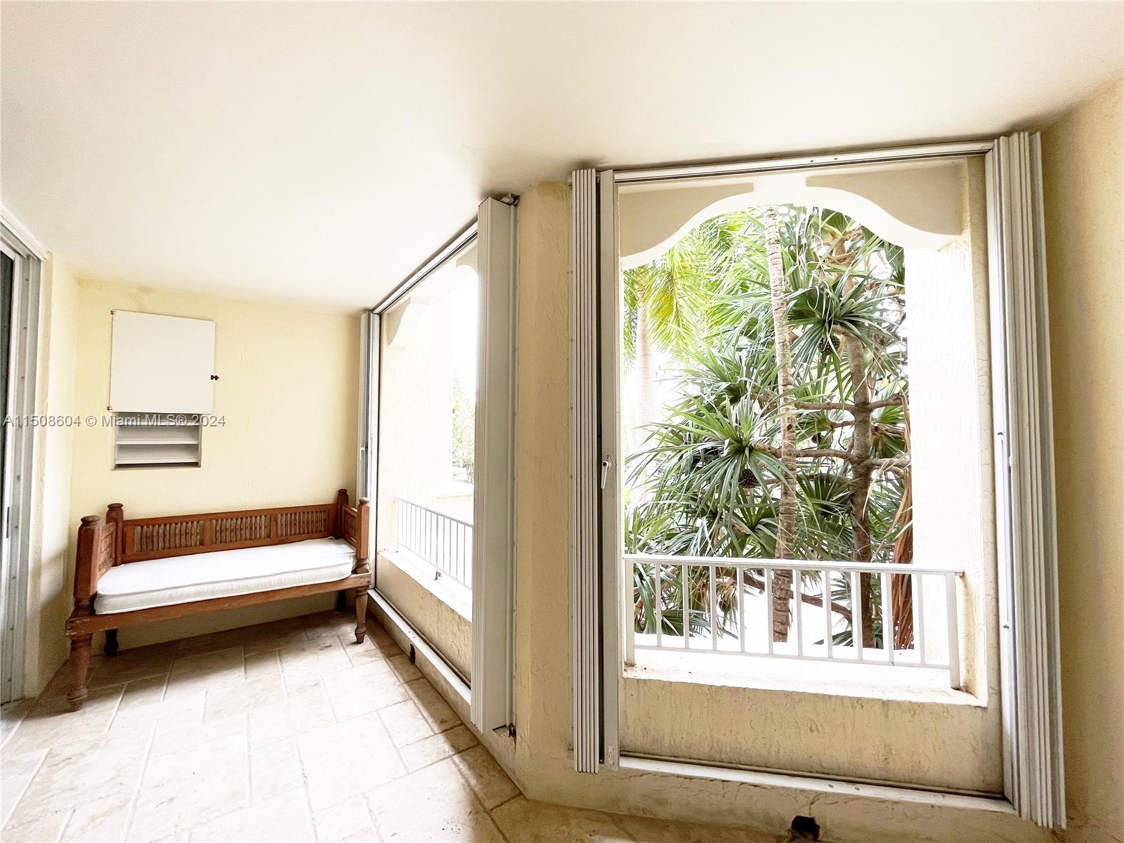 727 Crandon Boulevard, Unit 202 Key Biscayne, FL 33149 - Photo 21 of 32 a view of a room with window