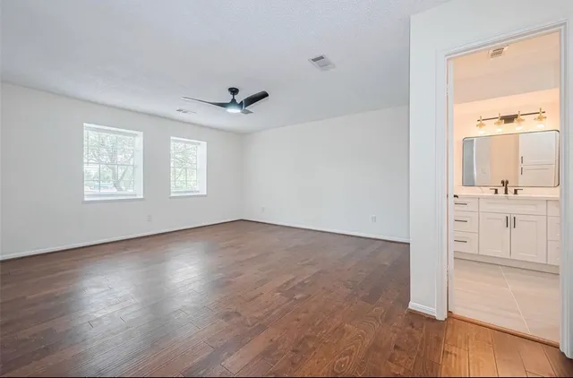 a view of a hallway view with staircase