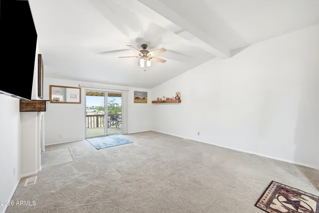 a bathroom with a double vanity sink toilet mirror and shower