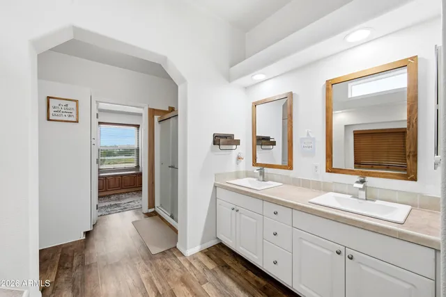 a view of an ocean beach and a yard