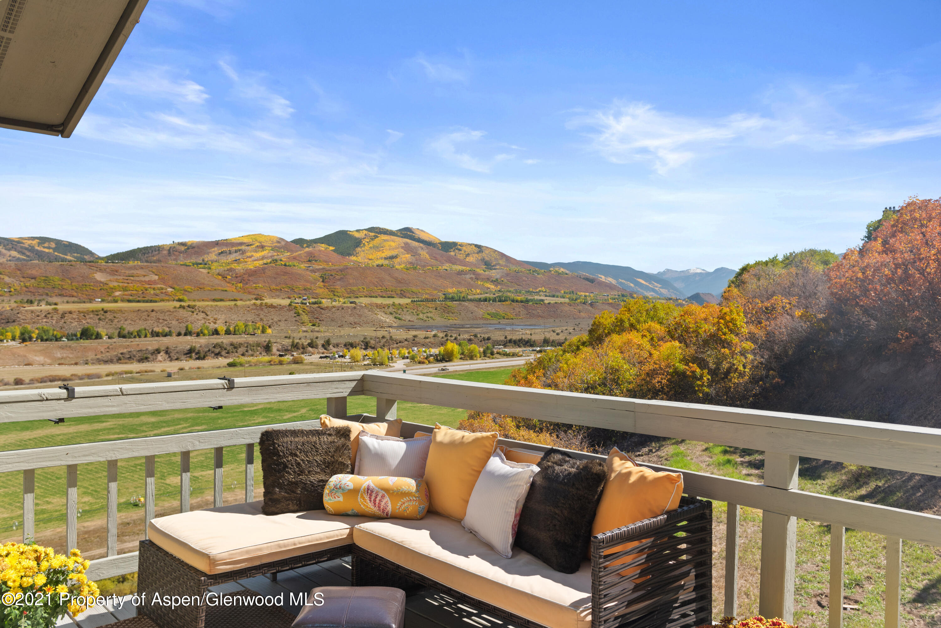 474 Upper Ranch Road Aspen, CO 81611 - Photo 28 of 43 a view of a two chairs in the balcony