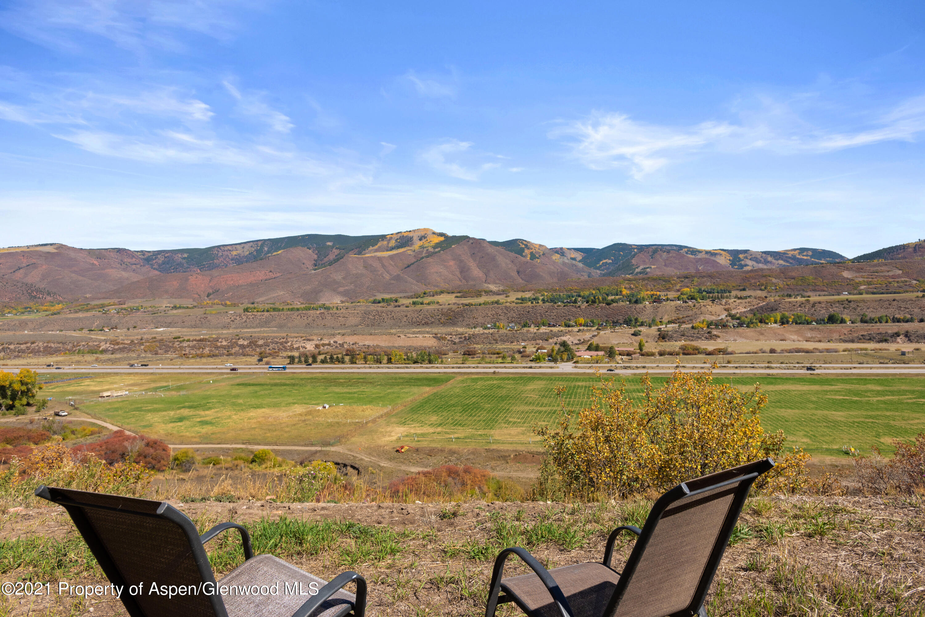 474 Upper Ranch Road Aspen, CO 81611 - Photo 32 of 43 a view of a city with an ocean