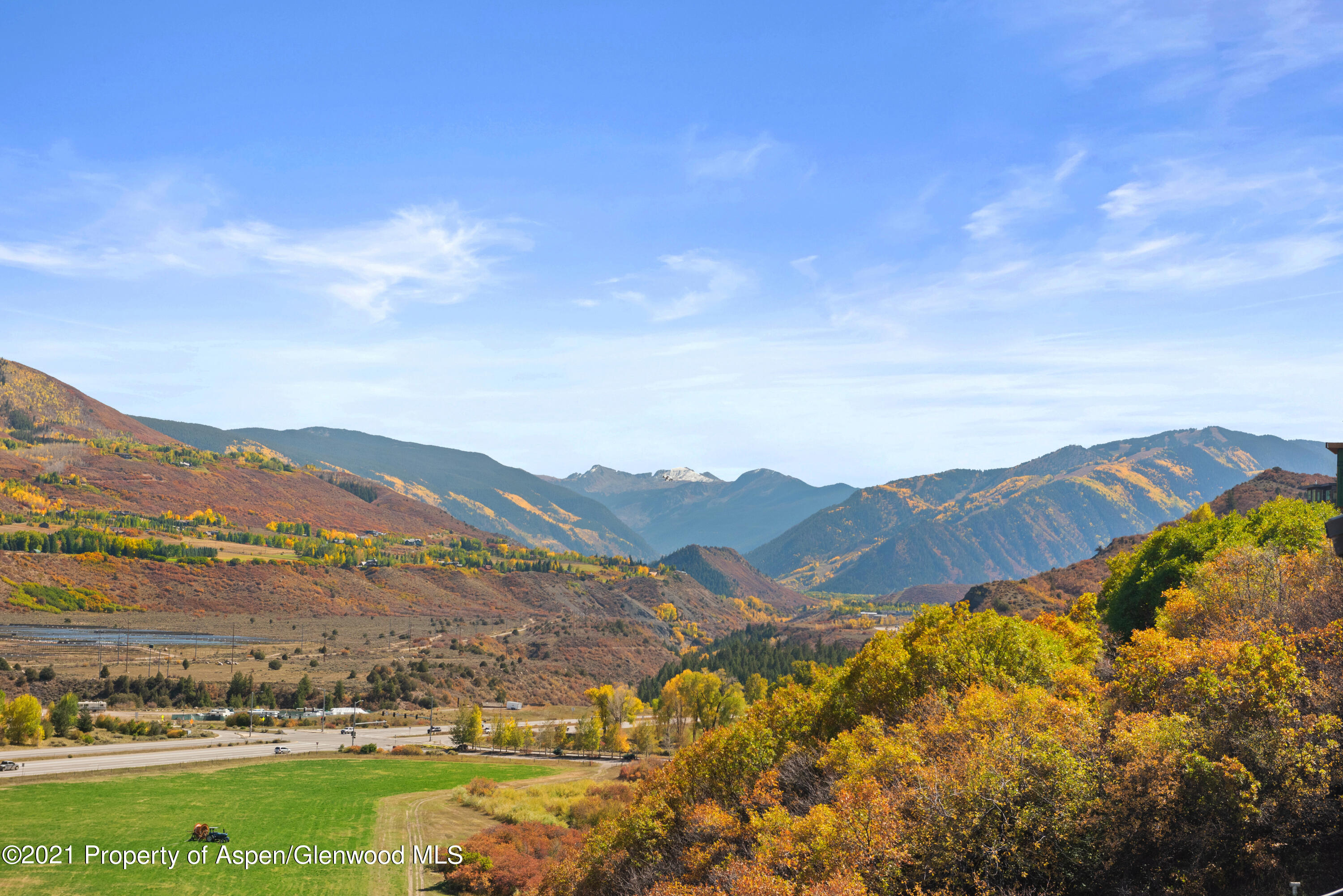 474 Upper Ranch Road Aspen, CO 81611 - Photo 36 of 43 a view of a city with mountains in the background
