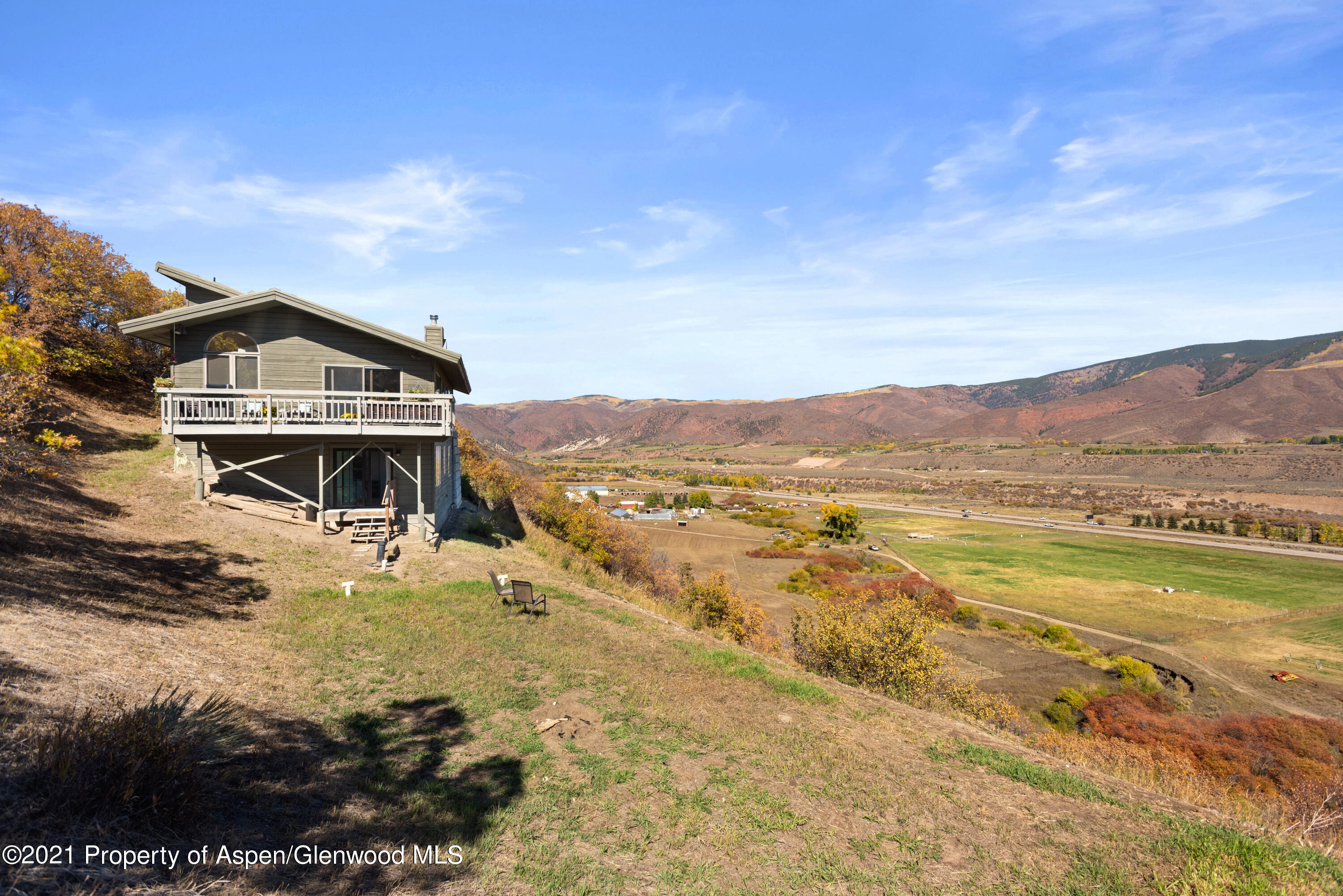 474 Upper Ranch Road Aspen, CO 81611 - Photo 41 of 43 a view of a lake with a mountain in the background
