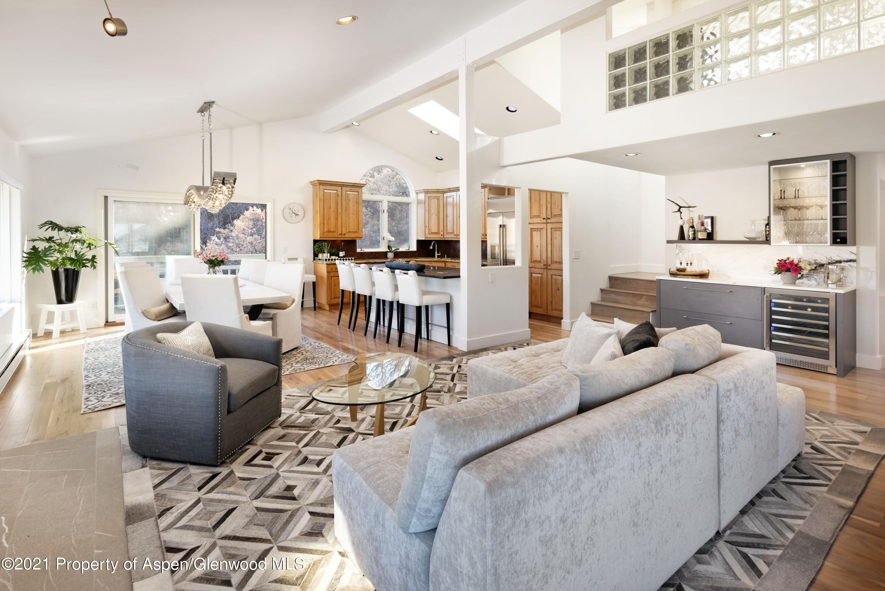 474 Upper Ranch Road Aspen, CO 81611 - Photo 6 of 43 a living room with furniture and wooden floor